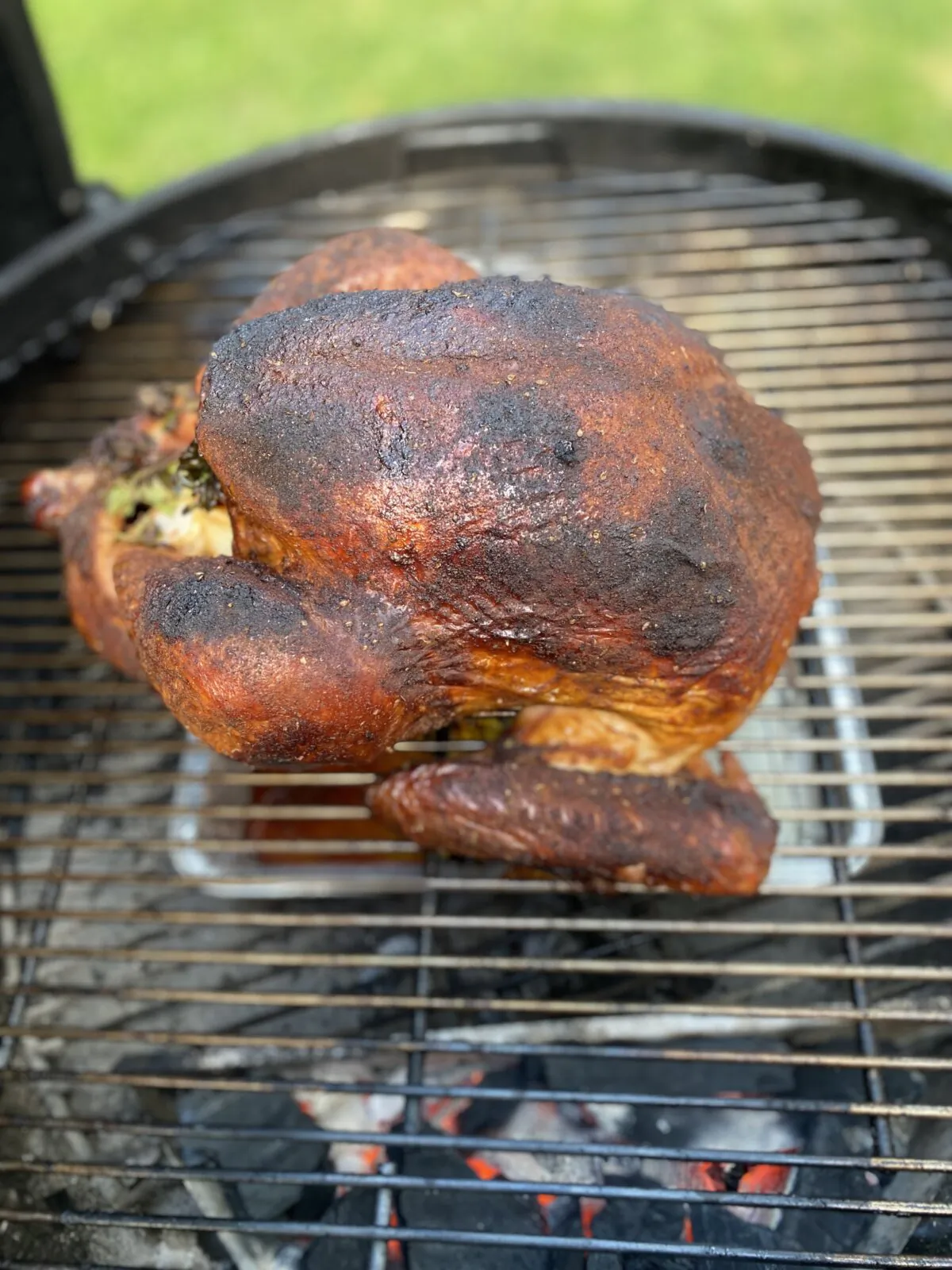 Using the grill to roast an unstuffed bird frees up the oven for side dishes. (JeanMarie Brownson/TNS)