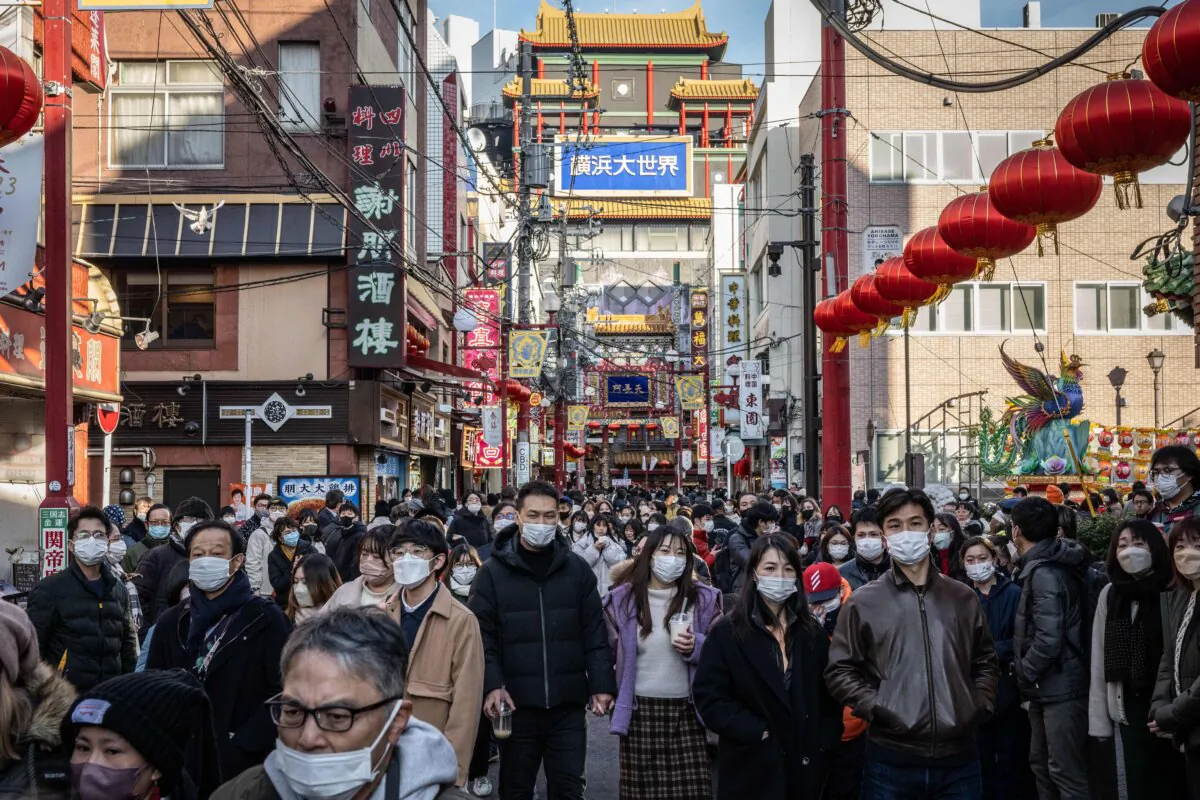 People visit the Chinatown area of Yokohama, Japan, on Jan. 22, 2023. (Yuichi Yamazaki/ AFP via Getty Images)