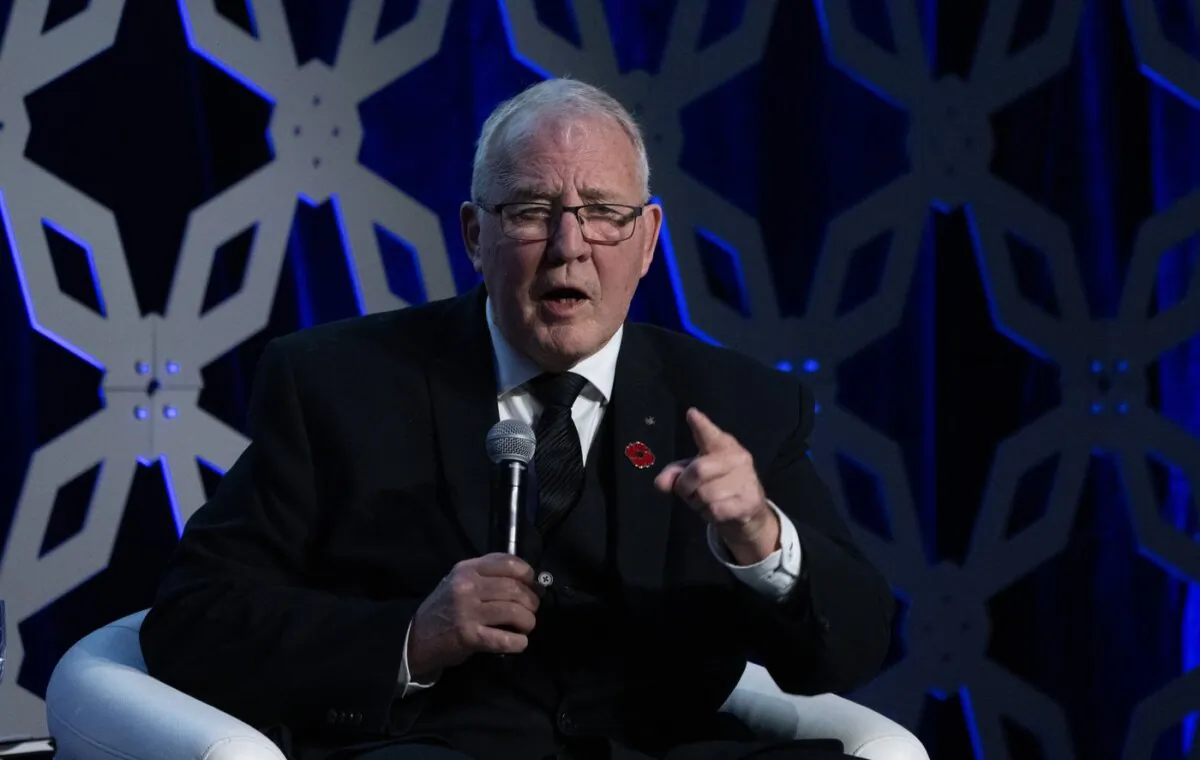 Minister of National Defence Bill Blair gestures as he speaks at the Canadian Aerospace Summit in Ottawa on Nov. 8, 2023. (The Canadian Press/Adrian Wyld)