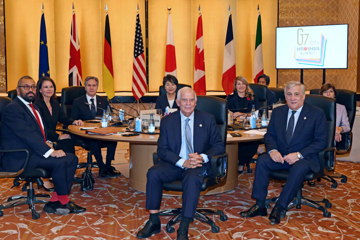 (L–R) British Foreign Minister James Cleverly, German Foreign Minister Annalena Baerbock, U.S. Secretary of State Antony Blinken, Japanese Foreign Minister Yoko Kamikawa, EU Foreign Minister Josep Borrell (front), Canadian Foreign Minister Melanie Joly, Italian Foreign Minister Antonio Tajani (front), and French Foreign Minister Catherine Colonna pose for a photo at the beginning of session 1 of the G7 Foreign Ministers' meeting at the foreign ministry's Iikura guesthouse in Tokyo on Nov. 8, 2023. (POOL by Toshifumi Kitamura-AFP)