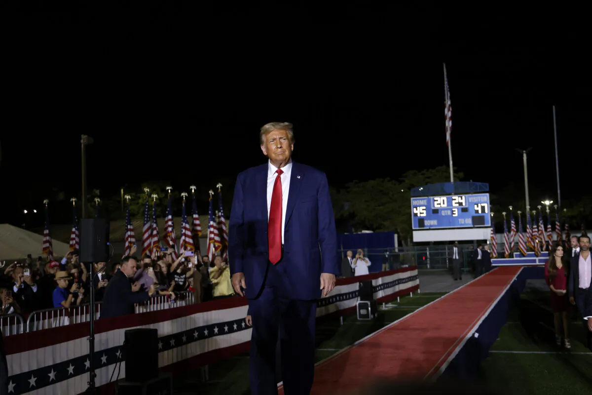 Former President Donald Trump arrives to deliver remarks during a campaign rally at the Ted Hendricks Stadium at Henry Milander Park in Hialeah, Fla., on Nov. 8, 2023. (Alon Skuy/Getty Images)