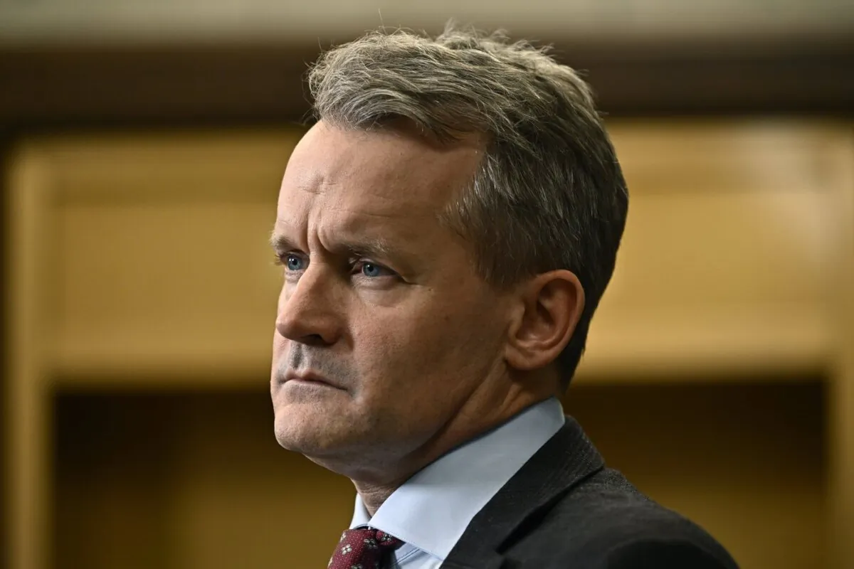 Minister of Labour Seamus O'Regan listens to a question from a reporter in the in the Foyer of the House of Commons on Parliament Hill in Ottawa, on Oct. 19, 2023. (The Canadian Press/Justin Tang)
