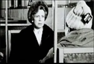 A Lady (Scotty Bloch) sits in a diner, in "Lunch Date." (Columbia University College of the Arts)