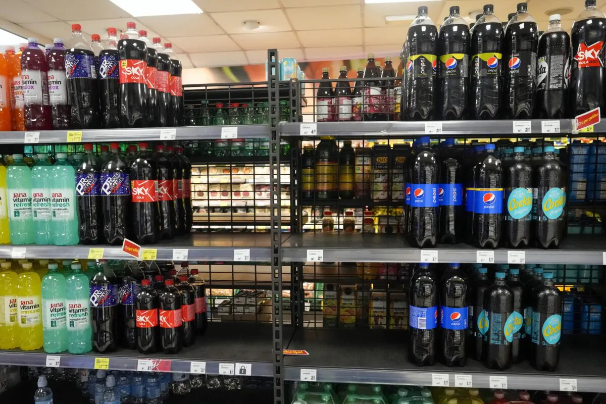 A shelf emptied of CocaCola drinks at a grocery shop in Zagreb, Croatia, on Nov. 8, 2023. (Darko Bandic/AP Photo)