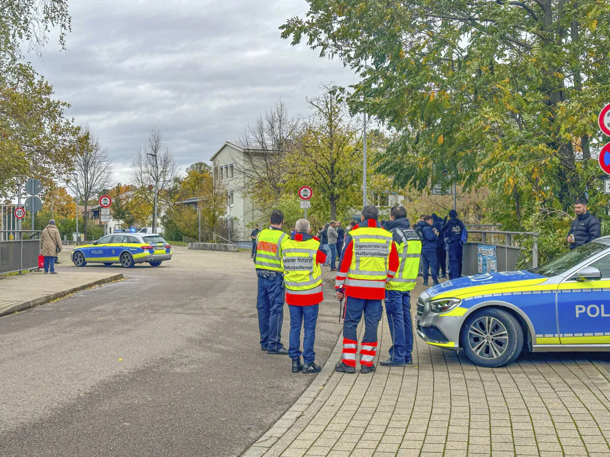 Police officers stand by a school in Offenburg, Germany, on Nov. 9, 2023. (Christina Häußler/Einsatz-Report24/dpa via AP)