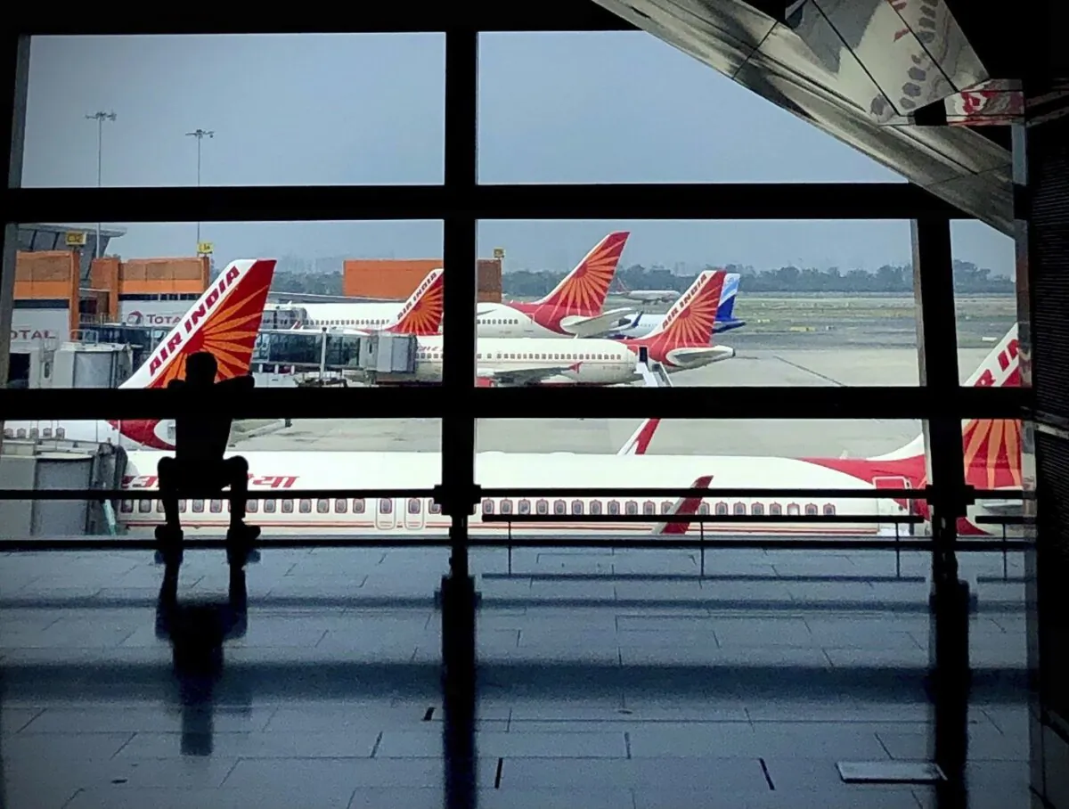 Air India planes are parked at Indira Gandhi International Airport in New Delhi, India, Aug. 30, 2021. (The Canadian Press/AP, Manish Swarup)
