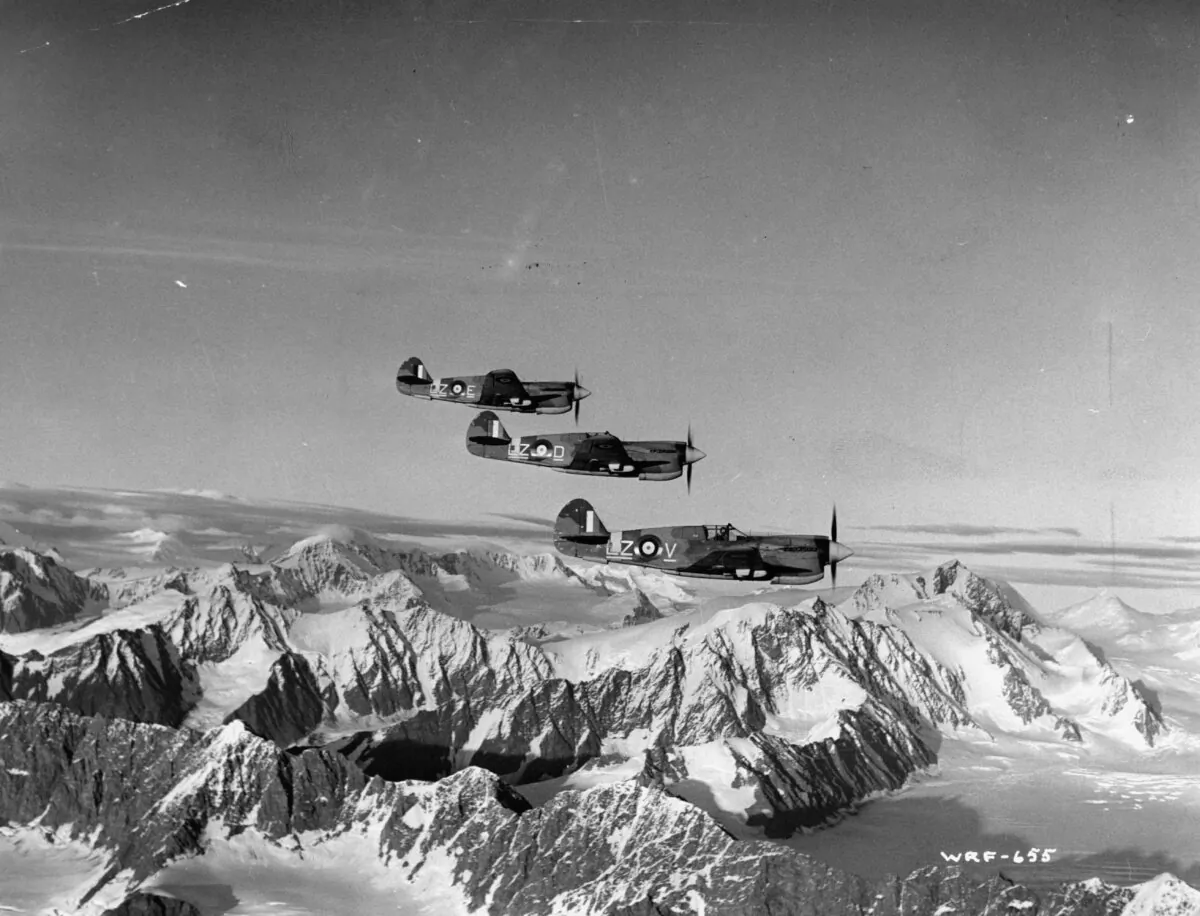 Royal Canadian Air Force Kittyhawks fly over northern Alaskan mountain ranges to defend against Japanese aggression during World War II. (Authenticated News/Archive Photos/Getty Images)