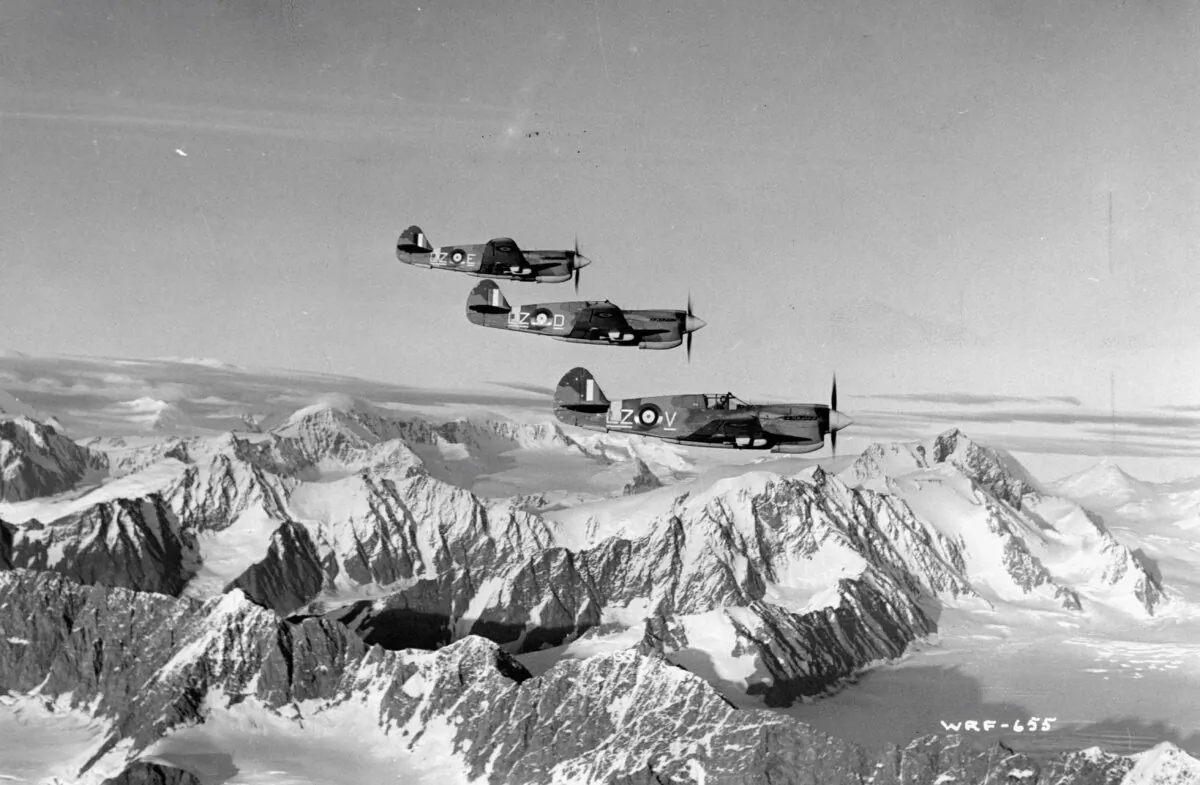 Royal Canadian Air Force Kittyhawks fly over northern Alaskan mountain ranges to defend against Japanese aggression during World War II. (Authenticated News/Archive Photos/Getty Images)