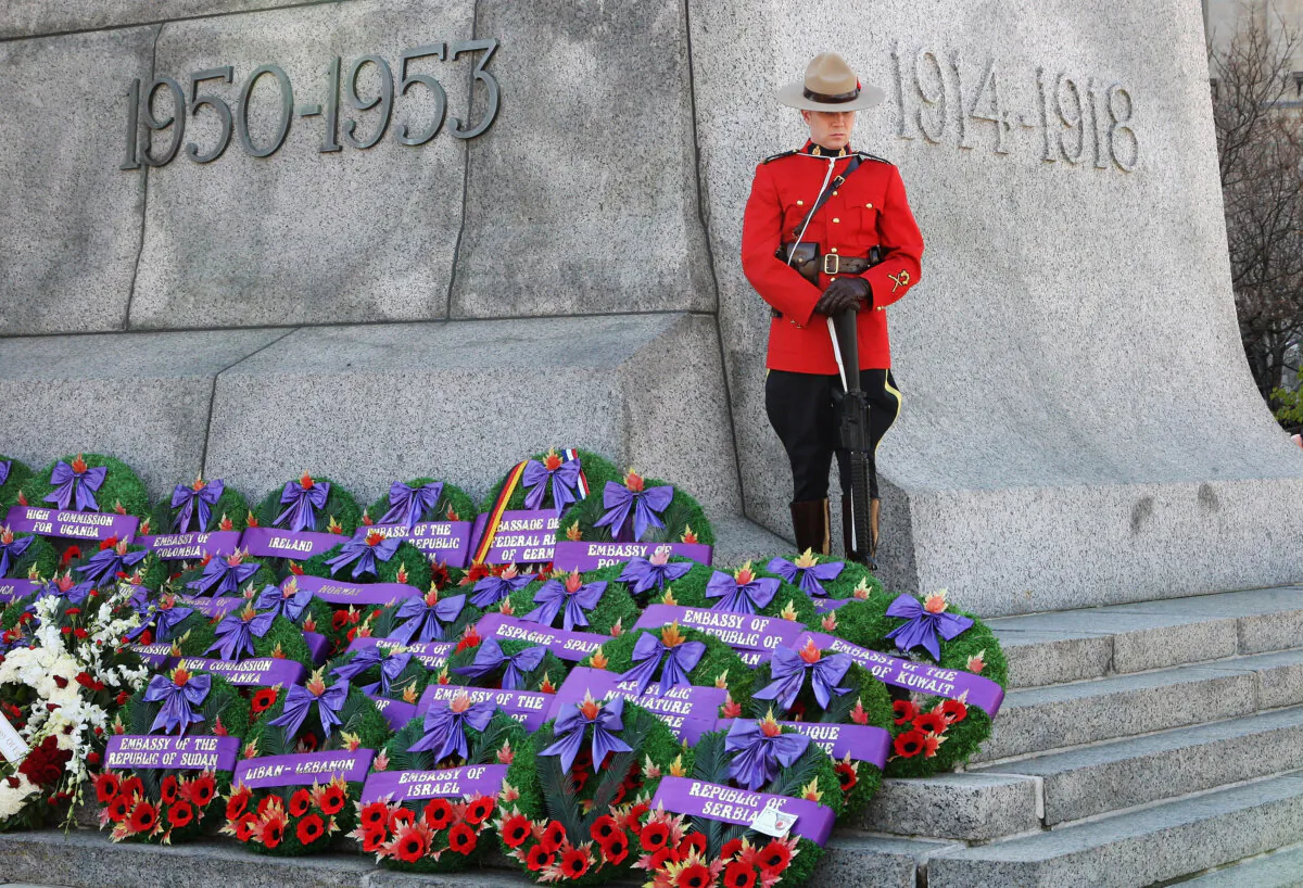 A member of the RCMP stands at the National War Memorial during a Remembrance Day ceremony in Ottawa on Nov. 11, 2009. (Chris Jackson/Getty Images)