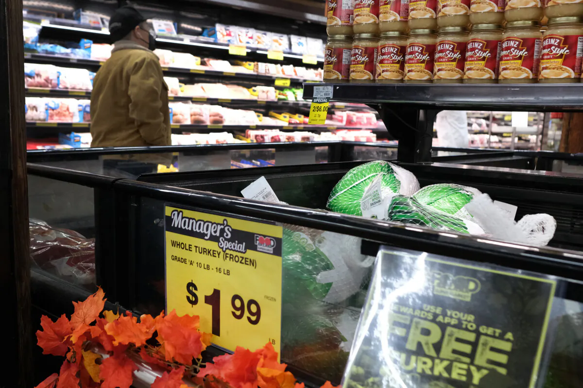 Price of turkey is falling but Thanksgiving dinner is still expensive. (Spencer Platt/Getty Images/TNS)