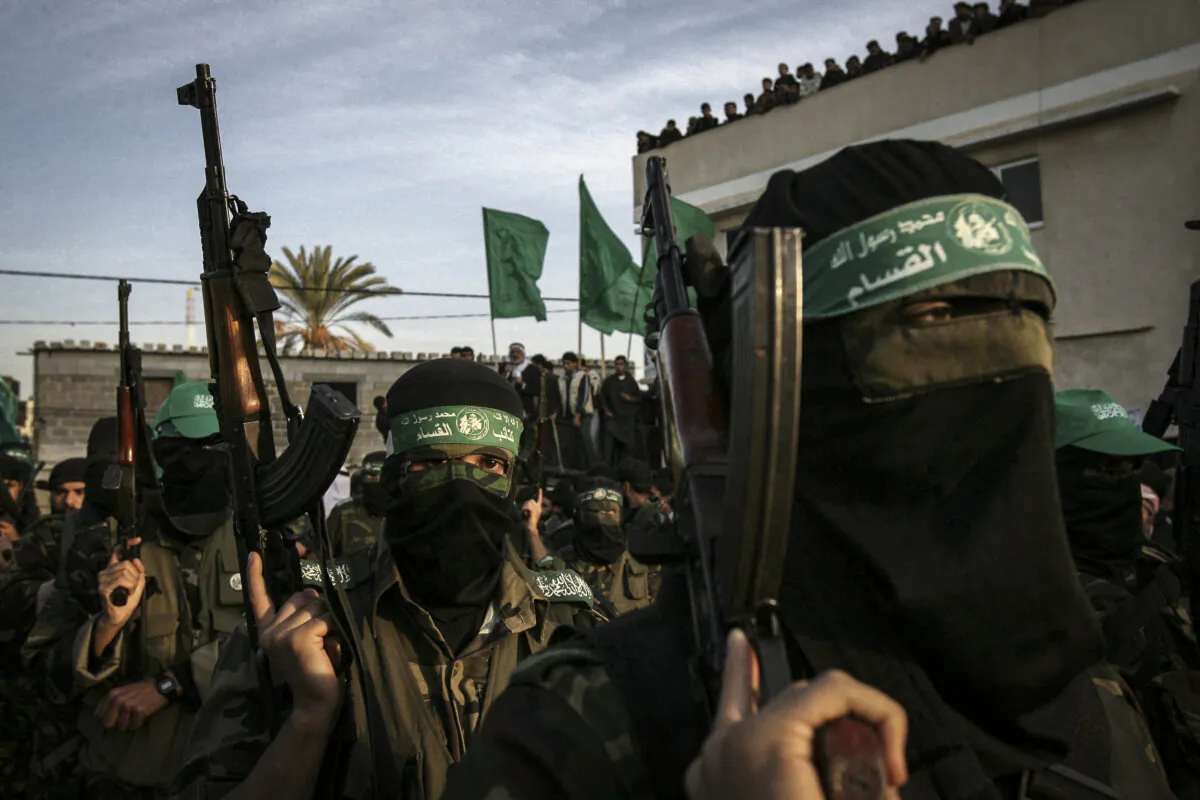 Members of Hamas march during a rally marking the 19th anniversary of Hamas in Khan Yunis in the Gaza Strip, on Dec. 14 2006. (Said Khatib/AFP via Getty Images)