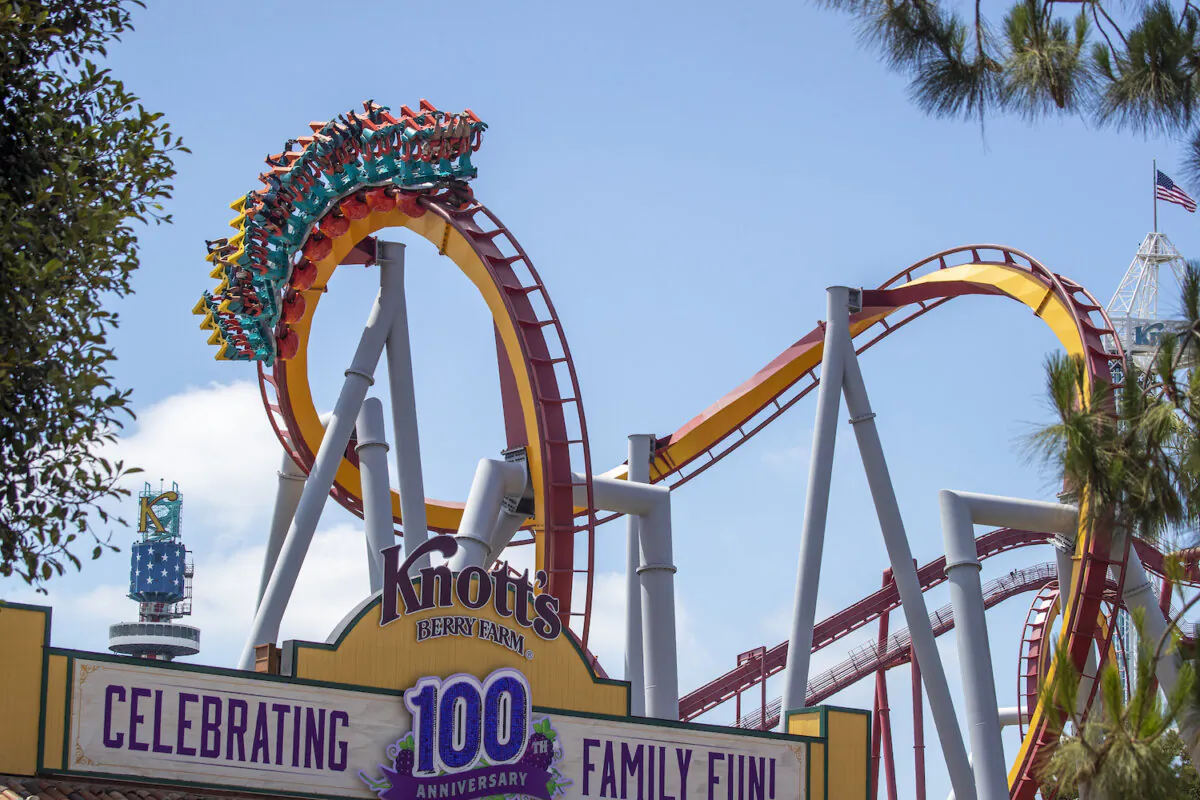 A view of the entrance as park-goers ride the Silver Bullet roller coaster during the re-opening day at Knott's Berry Farm to the full public and celebrate the 100th anniversary of the park after the easing of coronavirus pandemic restrictions Saturday, May 29, 2021 in Buena Park, CA. (Allen J. Schaben / Los Angeles Times)