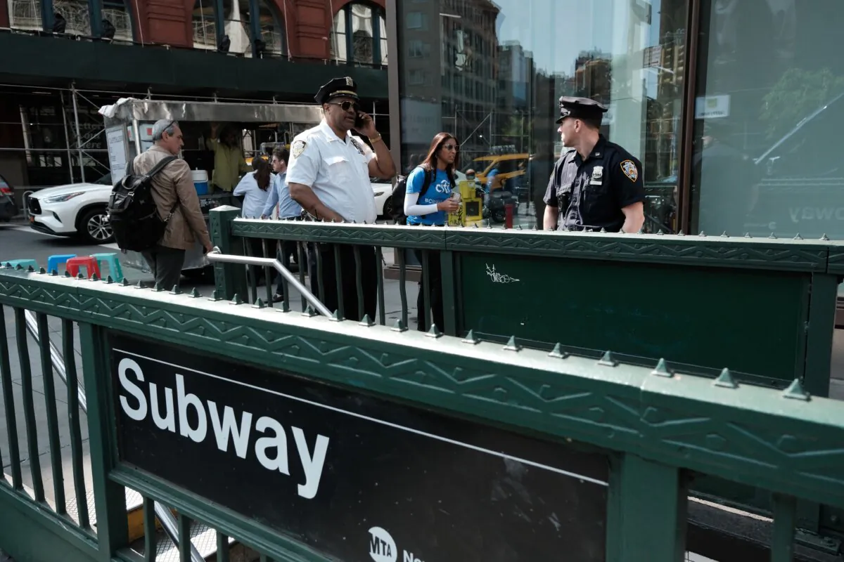 Police stand outside the Broadway-Lafayette subway station in New York on May 10, 2023. (Spencer Platt/Getty Images)