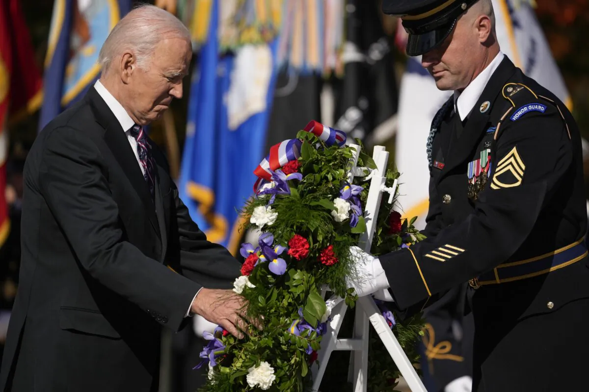 President Joe Biden lays a wreath at the Tomb of the Unknown Soldier at Arlington National Cemetery in Arlington, Va., on Nov. 11, 2023. (Andrew Harnik/AP Photo)