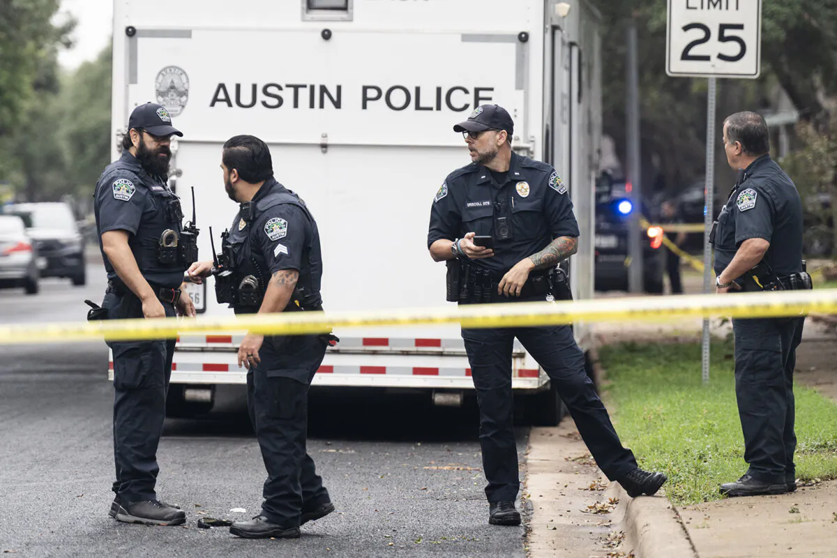 The Austin Police Department investigates the crime scene after an Austin police officer died following a shooting in South Austin, Texas, on Nov. 11, 2023. (Mikala Compton/Austin American-Statesman via AP)