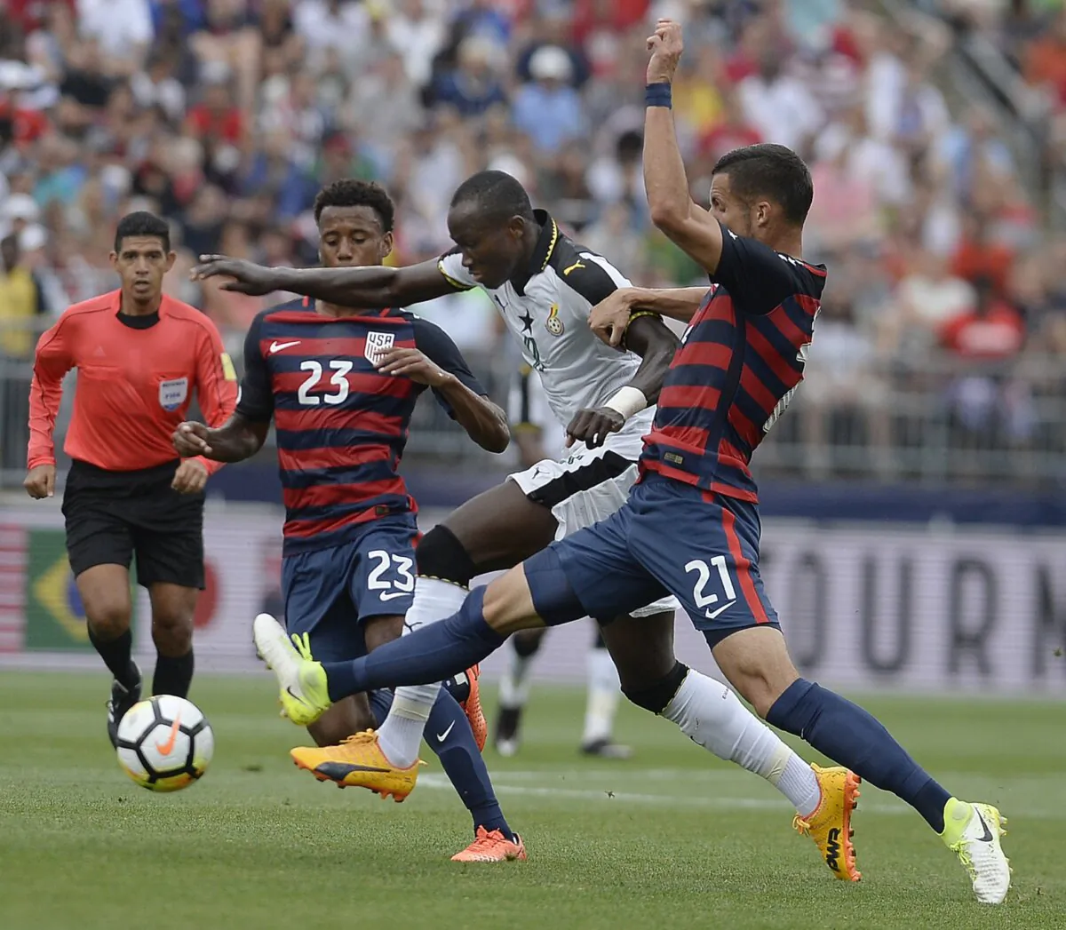 United States' Kellyn Acosta (L) and Matt Hedges (R) pressure Ghana's Raphael Dwamena (C), during the first half of an international friendly soccer match in East Hartford, Conn., on July 1, 2017. (Jessica Hill/AP Photo)