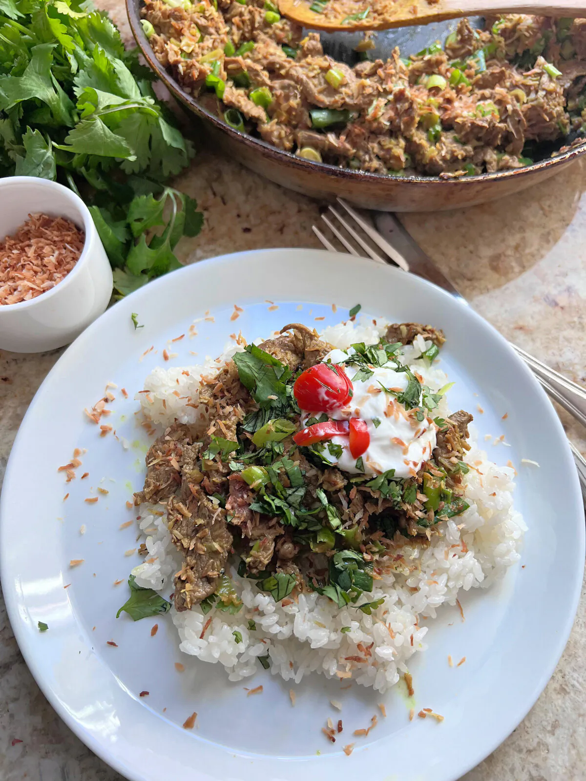 This easy, dry-style coconut beef curry from Milk Street's latest cookbook, "Simple," can be prepared in about 30 minutes. (Gretchen McKay/Post-Gazette)