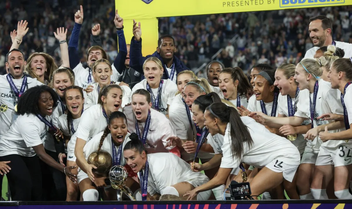 NJ/NY Gotham FC are awarded the NWSL Championship trophy after defeating the OL Reign during the 2023 NWSL Championship game in San Diego on Nov. 11, 2023. (Meg Oliphant/Getty Images)