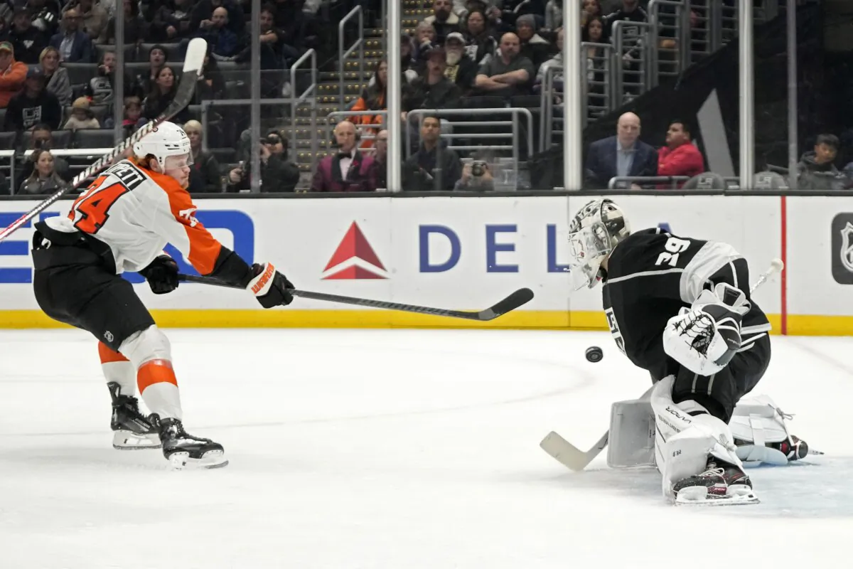 Philadelphia Flyers right wing Owen Tippett (L) scores on Los Angeles Kings goaltender Cam Talbot during the first period of an NHL hockey game in Los Angeles on Nov. 11, 2023. (Mark J. Terrill/AP Photo)