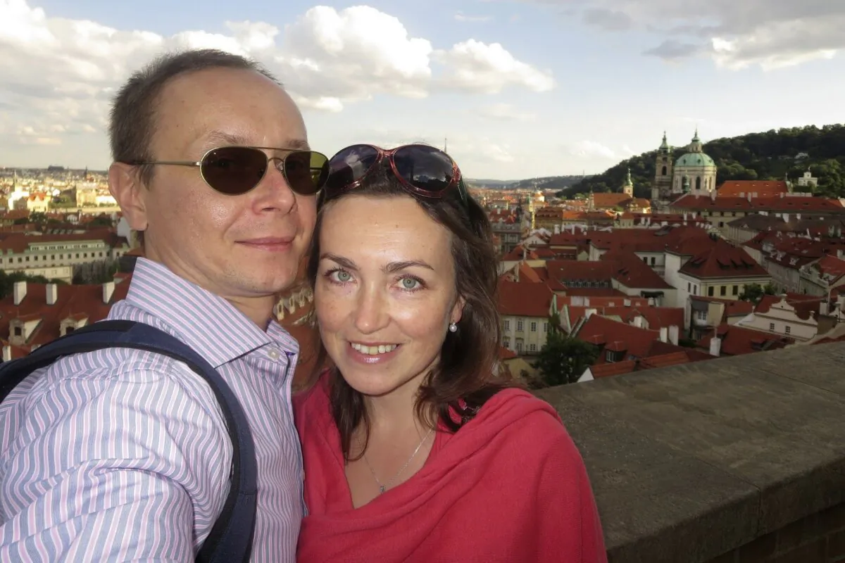 Pavel Butorin, director of the current time, TV, and digital platform of Radio Free Europe/Radio Liberty, and his wife Russian-American journalist Alsu Kurmacheva pose for a photo in Prague on Aug. 14, 2013. (Pavel Butorin via AP)
