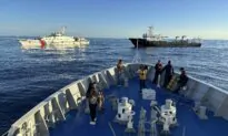 Dozens of Chinese Ships Chase Philippine Vessels as US Renews Warning It Will Defend Its Treaty Ally