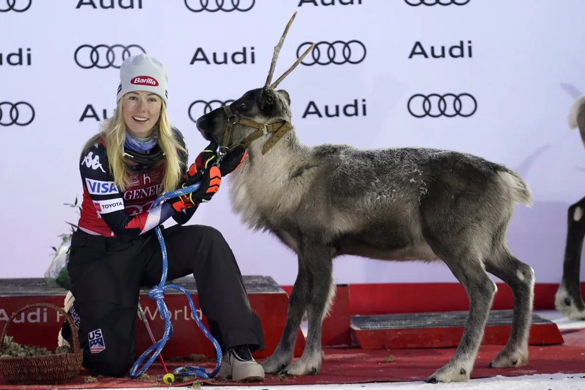 United States' Mikaela Shiffrin is given a reindeer after winning an alpine ski World Cup women's slalom race in Levi, Finland, on Nov. 12, 2023. (Giovanni Auletta/AP Photo)