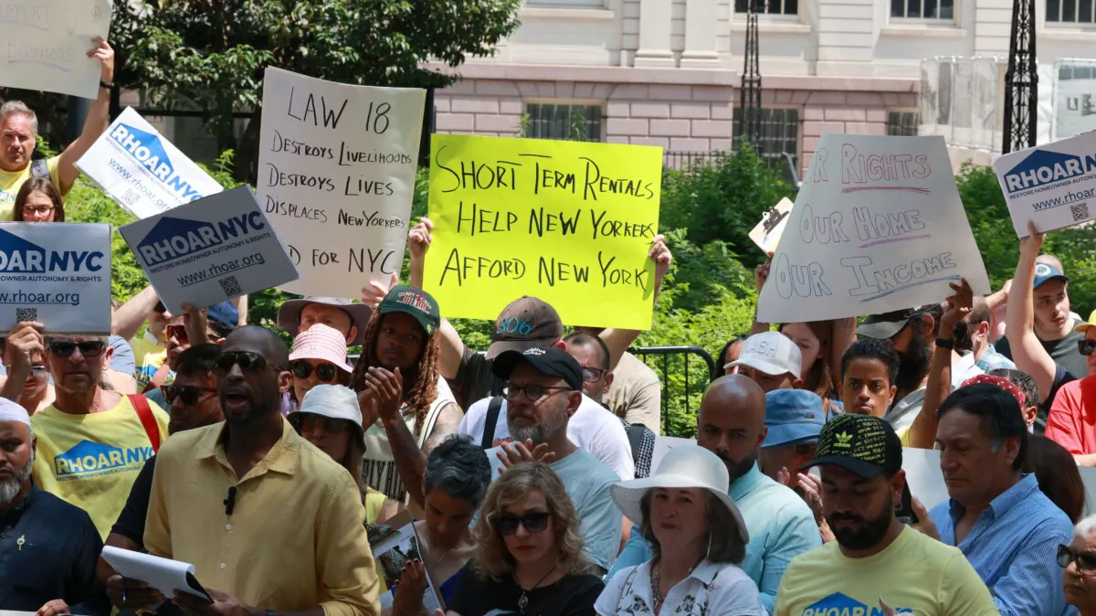 Airbnb hosts hold a press conference and rally outside New York City Hall to speak out against short-term rental regulations on July 12, 2023. (Luiz C. Ribeiro/New York Daily News/TNS)