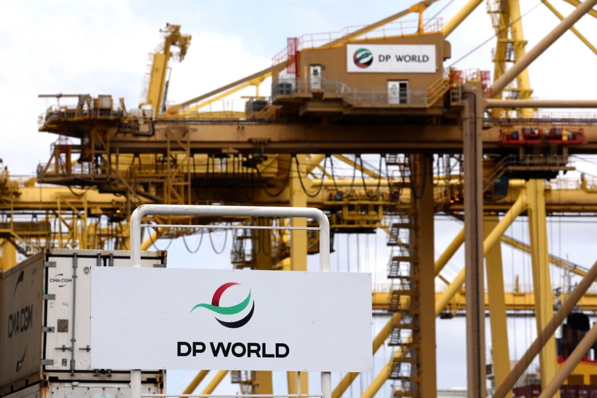 A gantry crane adorned with a logo for ports operator DP World at an entrance to the Port Botany compound in Sydney on Nov. 13, 2023. (David Gray/AFP via Getty Images)