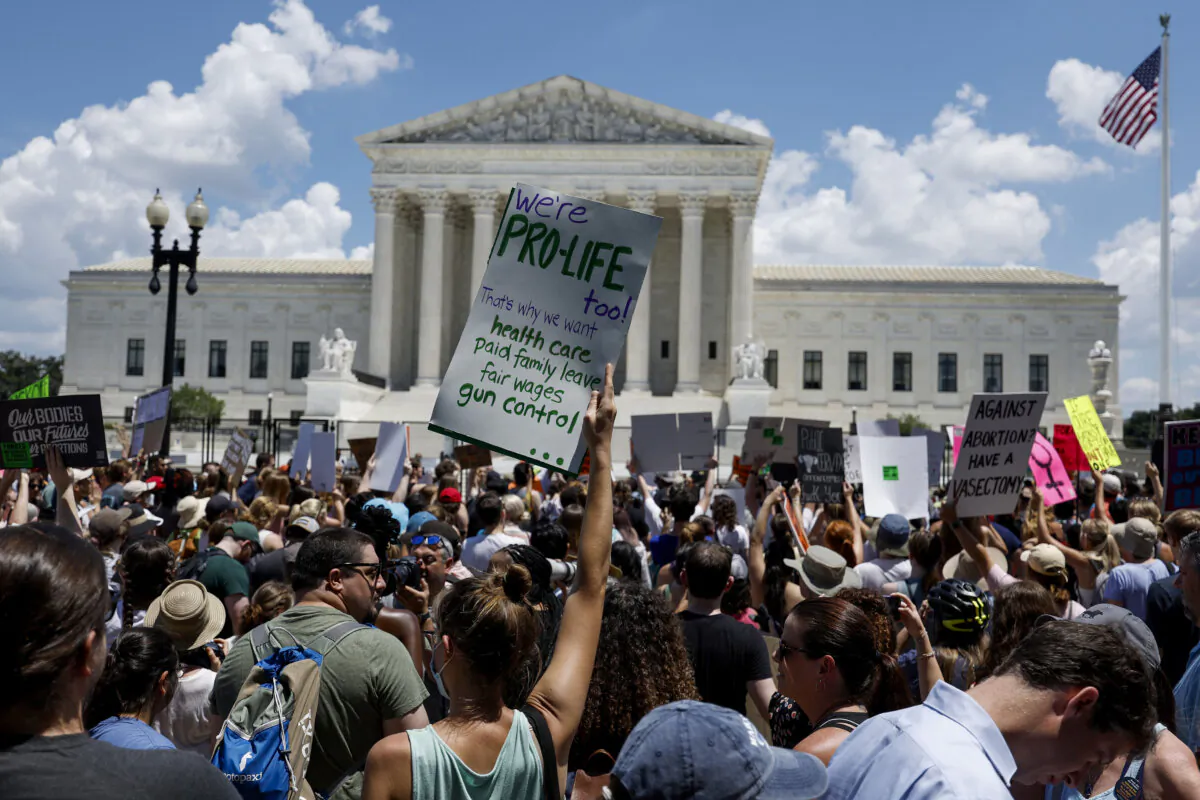 Pro-abortion and pro-life activists fill the street in front of the U.S. Supreme Court in Washington
during a protest in the wake of the decision to overturn Roe v. Wade, on June 25, 2022. (Anna Moneymaker/Getty Images)