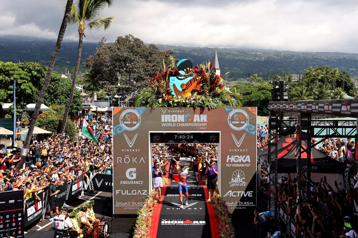 Gustav Iden of Norway celebrates after winning the IRONMAN World Championships on October 08, 2022 in Kailua Kona, Hawaii. (Photo by Ezra Shaw/Getty Images for IRONMAN)