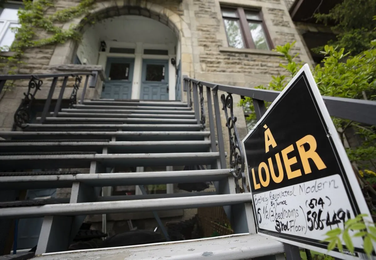 Real estate signage showing an apartment for rent is seen in Montreal on May 15, 2023. (The Canadian Press/Christinne Muschi)