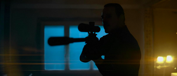 man with sniper rifle in THE KILLER
