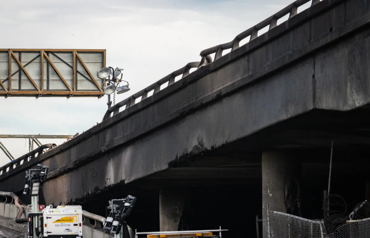 Damage caused by a fire created a temporary closure of Interstate 10 in Los Angeles on Nov. 13, 2023. (John Fredricks/The Epoch Times)