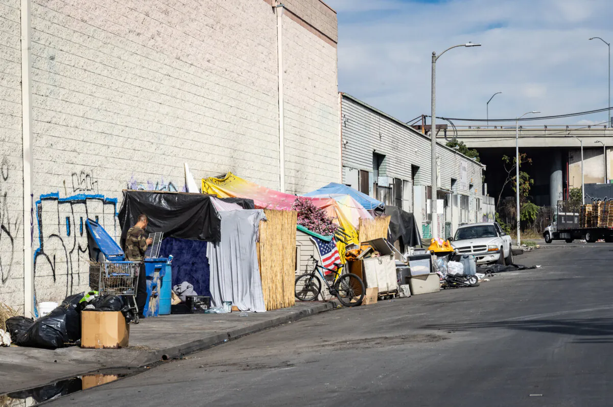A homeless encampment  near the 10 freeway in Los Angeles, Calif., on Nov. 13, 2023. (John Fredricks/The Epoch Times)