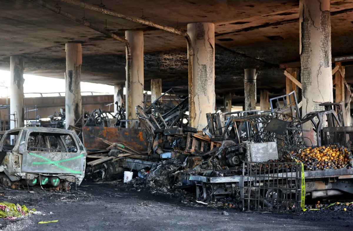 Fire damage is viewed beneath the closed I-10 elevated freeway following a large pallet fire, which occurred Nov. 11 at a storage yard, in Los Angeles on Nov. 13, 2023. (Mario Tama/Getty Images)