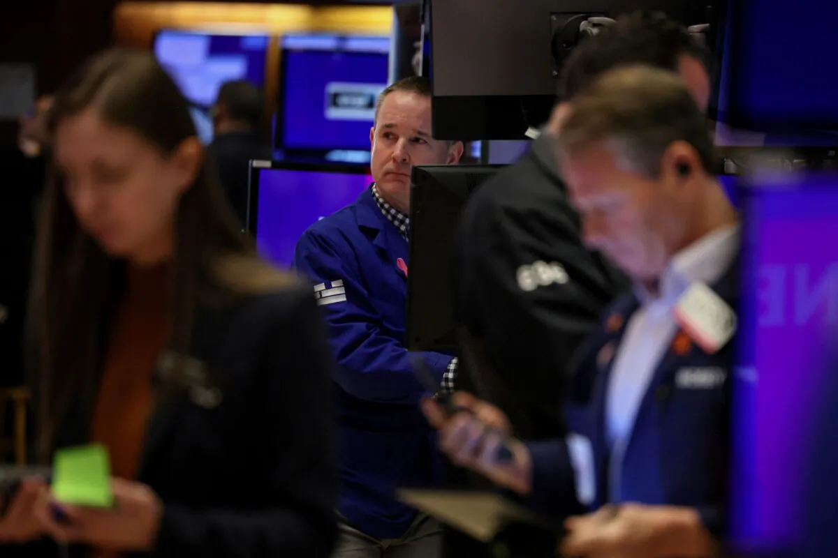 Traders work on the floor at the New York Stock Exchange (NYSE) in New York City on Oct. 23, 2023. (Brendan McDermid/Reuters)