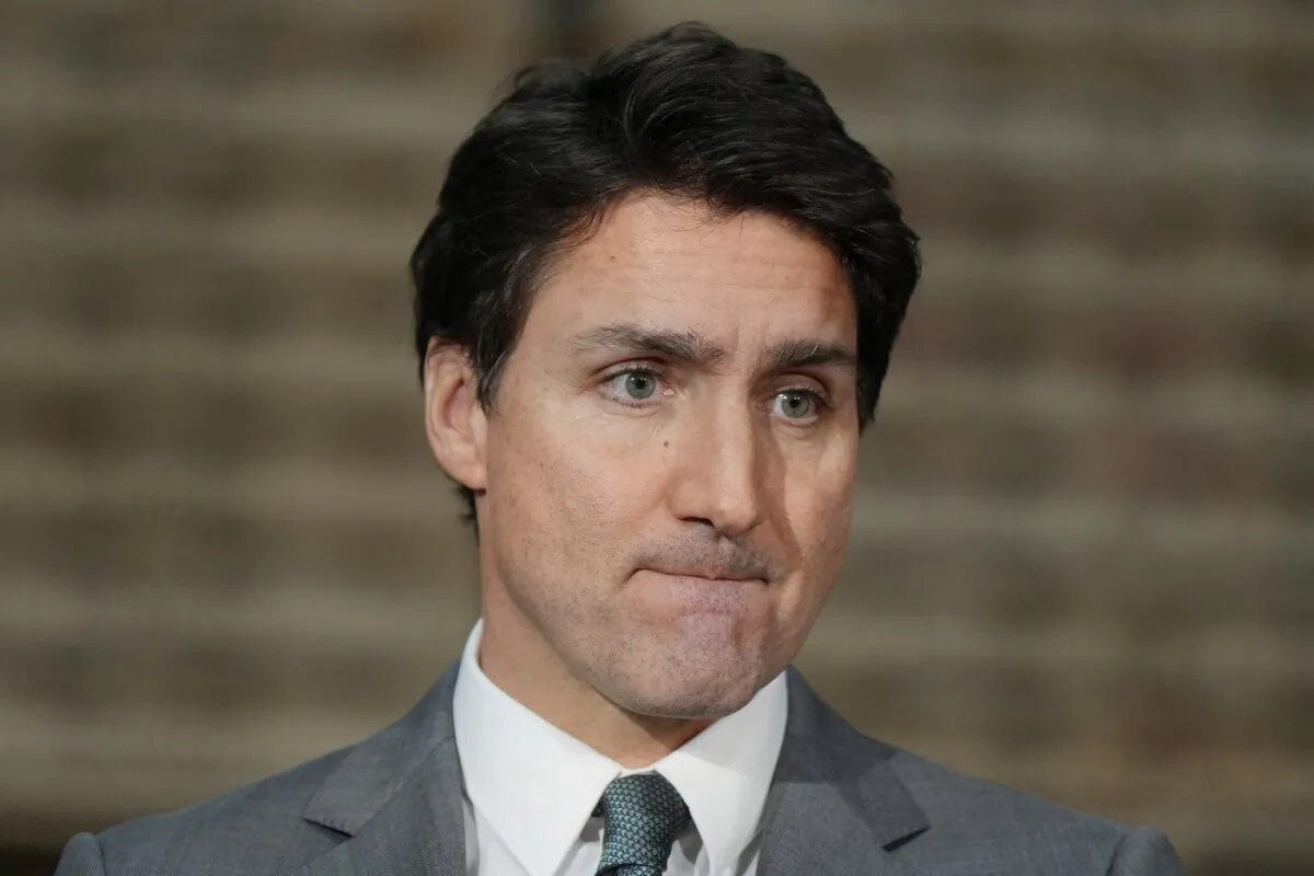 Prime Minister Justin Trudeau pauses while speaking about the Israel-Hamas war during a news conference at lithium battery manufacturer E-One Moli Energy (Canada), in Maple Ridge, B.C., on Nov. 14, 2023. (The Canadian Press/Darryl Dyck)