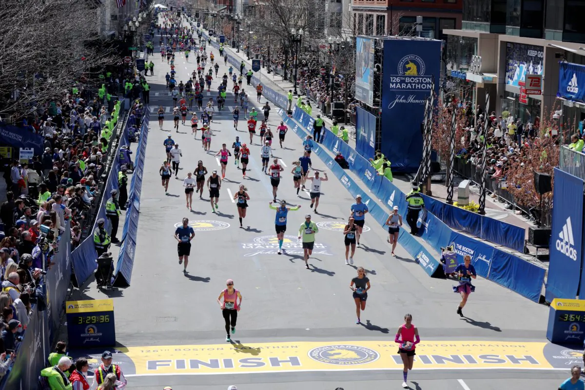 Runnings make their way down Boylston street to the finish line during the 126th Boston Marathon on April 18, 2022 in Boston, Massachusetts. (Omar Rawlings/Getty Images)