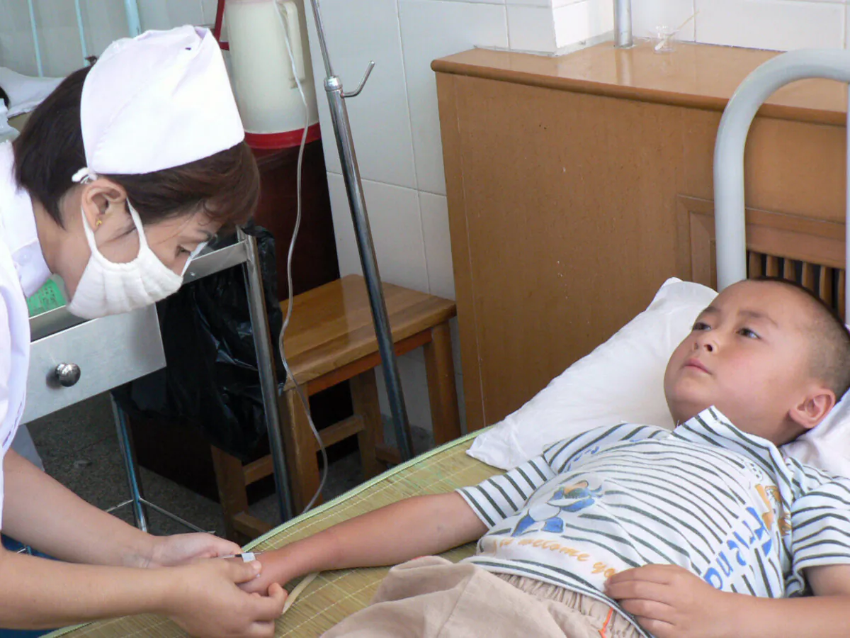 A Chinese boy gets treatment for lead poisoning at a hospital in Changqing, north China's Shaanxi province on Aug. 15, 2009. (STR/AFP via Getty Images)