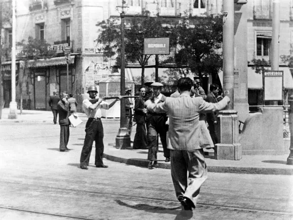 A man is arrested in the streets of Madrid during the Spanish Civil War in 1936. (AFP via Getty Images)