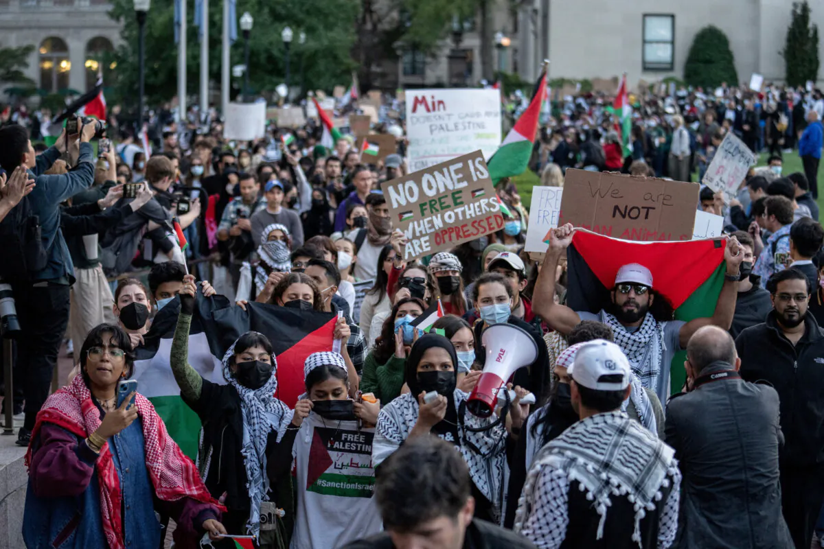 Pro-Palestinian students take part in a protest in support of the Palestinians amid the ongoing conflict in Gaza, at Columbia University in New York City, Oct. 12, 2023. (Jeenah Moon/Reuters)