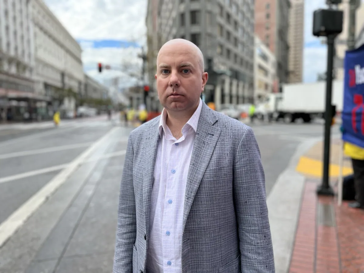 NTD reporter Jason Blair near the Moscone Center in San Francisco on Nov. 15, 2023. (Eva Fu/The Epoch Times)