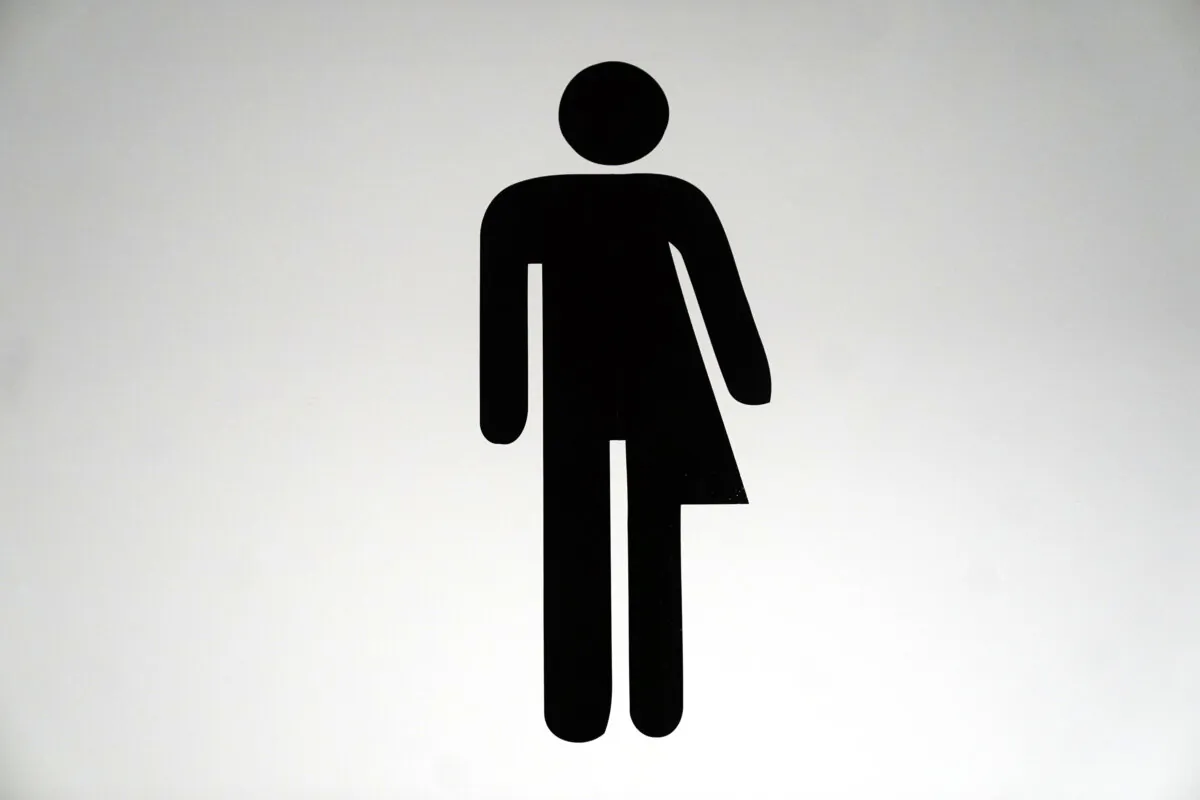 File photo of a sign for a unisex bathroom. (Victoria Jones/PA Wire)