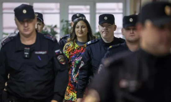 Russian Artist Who Staged Anti-War Protest in Supermarket Jailed for 7 Years