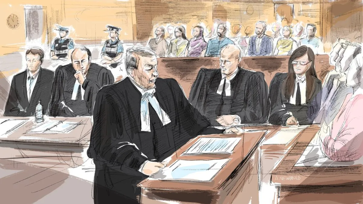 (L-R) Nathaniel Veltman, defence lawyer Peter Ketcheson, defence lawyer Christopher Hicks, crown attorney Fraser Ball, crown attorney Sarah Shaikh and members of the jury attend Mr. Veltman's trial in Windsor, Ont., in a courtroom sketch, on Nov.14, 2023. (The Canadian Press/Alexandra Newbould)