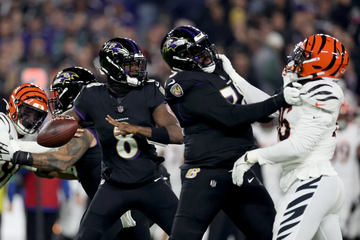 Lamar Jackson (8) of the Baltimore Ravens looks to throw a pass against the Cincinnati Bengals during the first quarter of the game in Baltimore on Nov. 16, 2023. (Patrick Smith/Getty Images)
