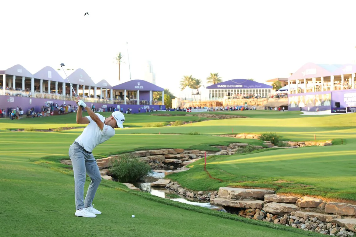 Nicolai Hojgaard of Denmark plays his second shot on the 18th hole during Day Two of the DP World Tour Championship at Jumeirah Golf Estates in Dubai on Nov. 17, 2023. (Andrew Redington/Getty Images)