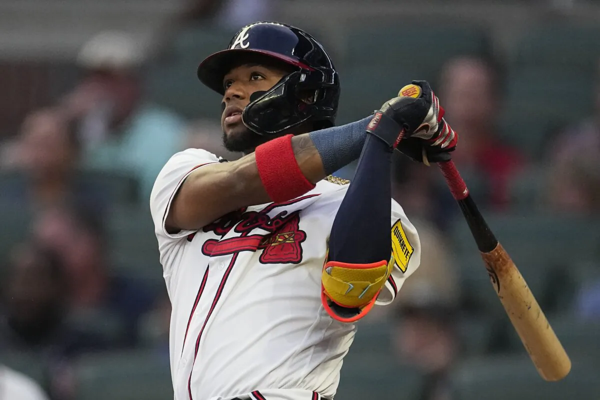 Atlanta Braves' Ronald Acuna Jr. watches his solo home run in the first inning of a baseball game against the Philadelphia Phillies on Sept. 19, 2023. (John Bazemore/AP Photo)