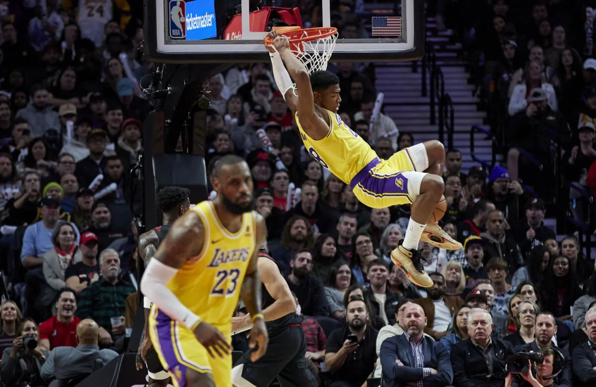 Los Angeles Lakers forward Rui Hachimura dunks against the Portland Trail Blazers during the second half of an NBA basketball In-Season Tournament game in Portland on Nov. 17, 2023. (Craig Mitchelldyer/AP Photo)