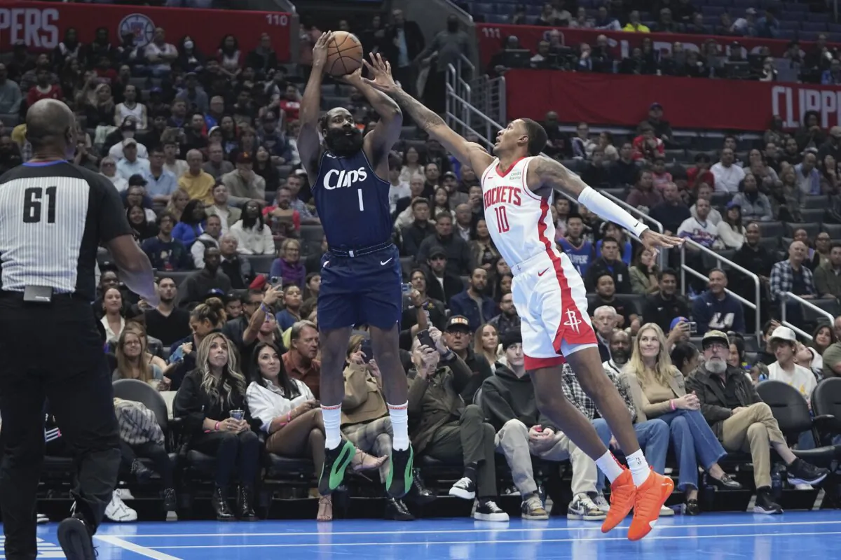 Los Angeles Clippers guard James Harden (L) shoots as Houston Rockets forward Jabari Smith Jr. defends during the first half of an NBA basketball In-Season Tournament game in Los Angeles on Nov. 17, 2023. (Mark J. Terrill/AP Photo)